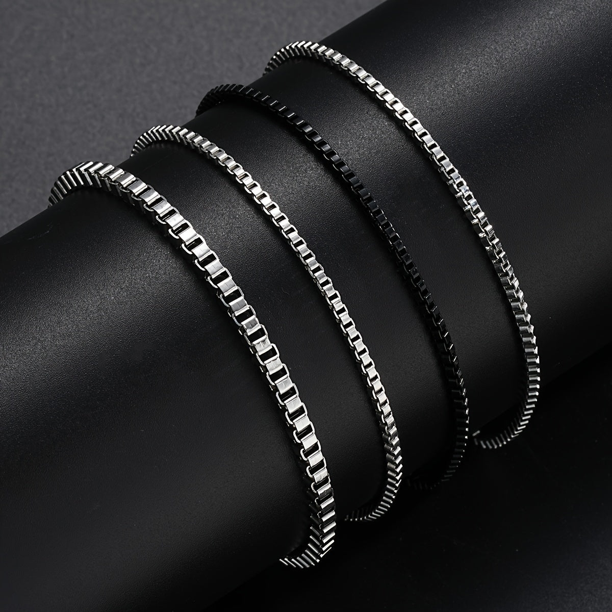 A Set of 4 Minimalist And Stylish Stainless Steel Bracelets for Men, Perfect for Gifting to a Boyfriend for Dates Or Everyday Wear.