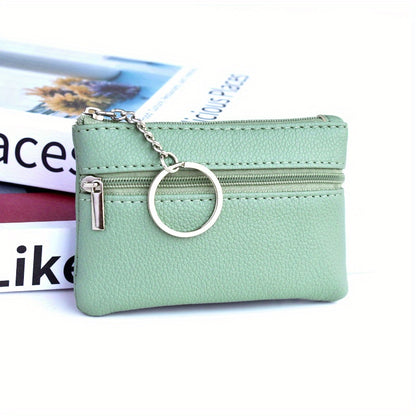 A Small Wallet with a Keychain That Holds Coins in a Mini Coin Purse.