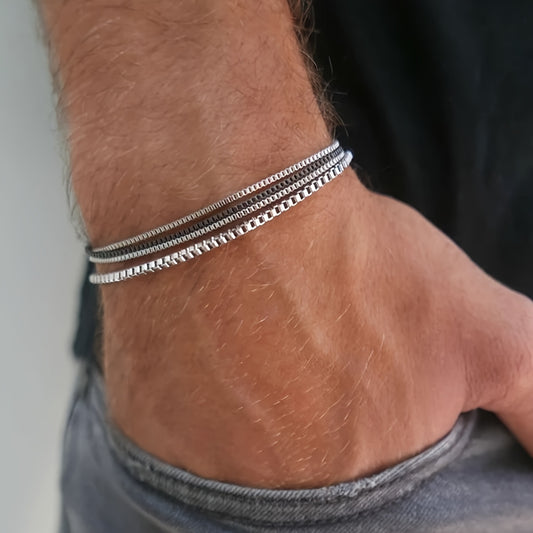 A Set of 4 Minimalist And Stylish Stainless Steel Bracelets for Men, Perfect for Gifting to a Boyfriend for Dates Or Everyday Wear.