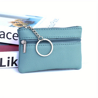 A Small Wallet with a Keychain That Holds Coins in a Mini Coin Purse.