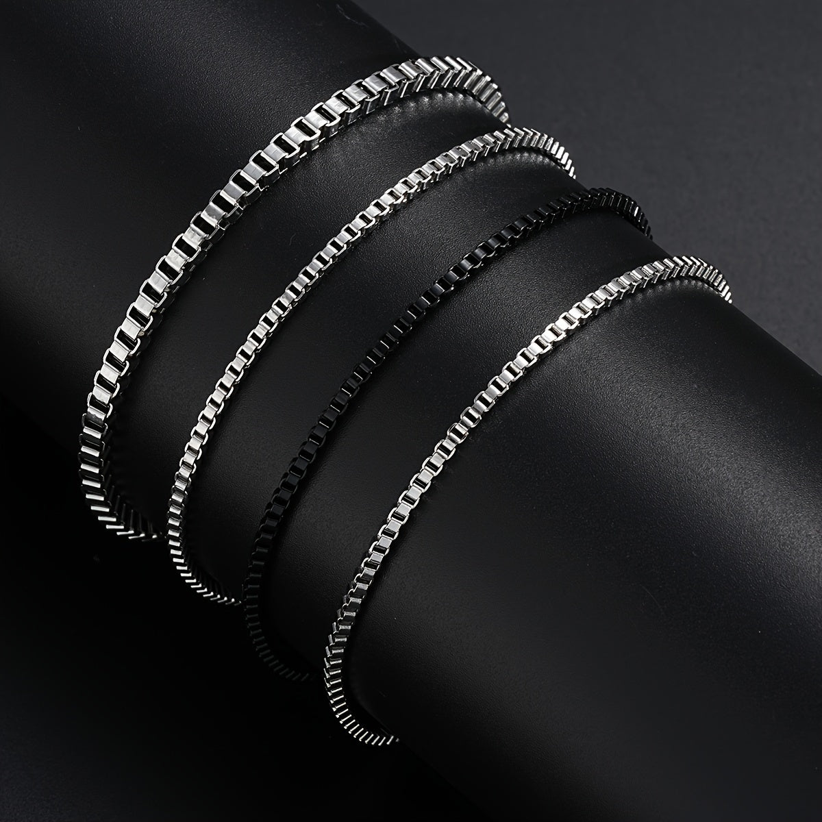 A Set of 4 Minimalist And Stylish Stainless Steel Bracelets for Men, Perfect for Gifting to a Boyfriend for Dates Or Everyday Wear.