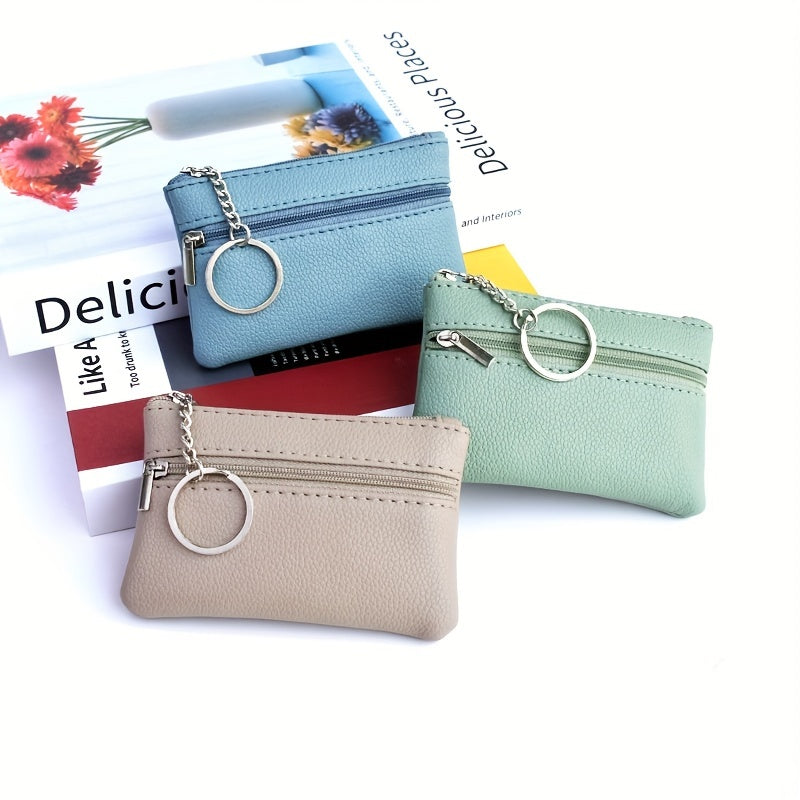 A Small Wallet with a Keychain That Holds Coins in a Mini Coin Purse.