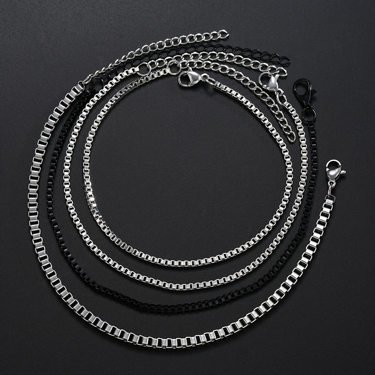 A Set of 4 Minimalist And Stylish Stainless Steel Bracelets for Men, Perfect for Gifting to a Boyfriend for Dates Or Everyday Wear.