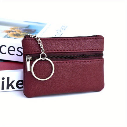 A Small Wallet with a Keychain That Holds Coins in a Mini Coin Purse.